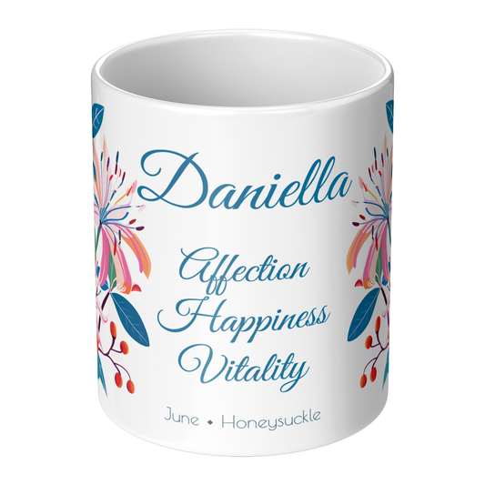 White mug with floral design and text on a white background
