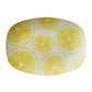 Oval-shaped platter with lemon slice pattern on a white background