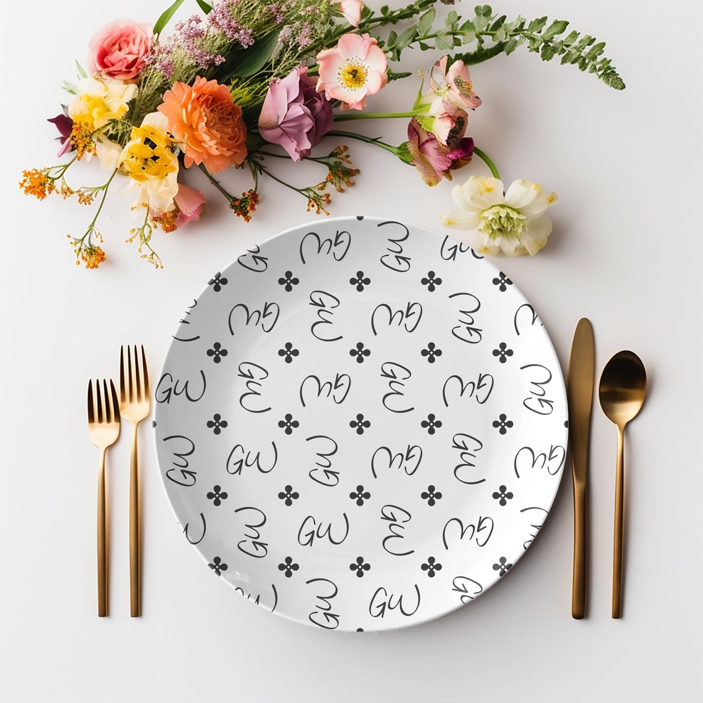 Personalized White and Black Stylized Monogram Plate Set features customized initials set in a repeating pattern accented with a stylish motif for an all-over, unique custom design.