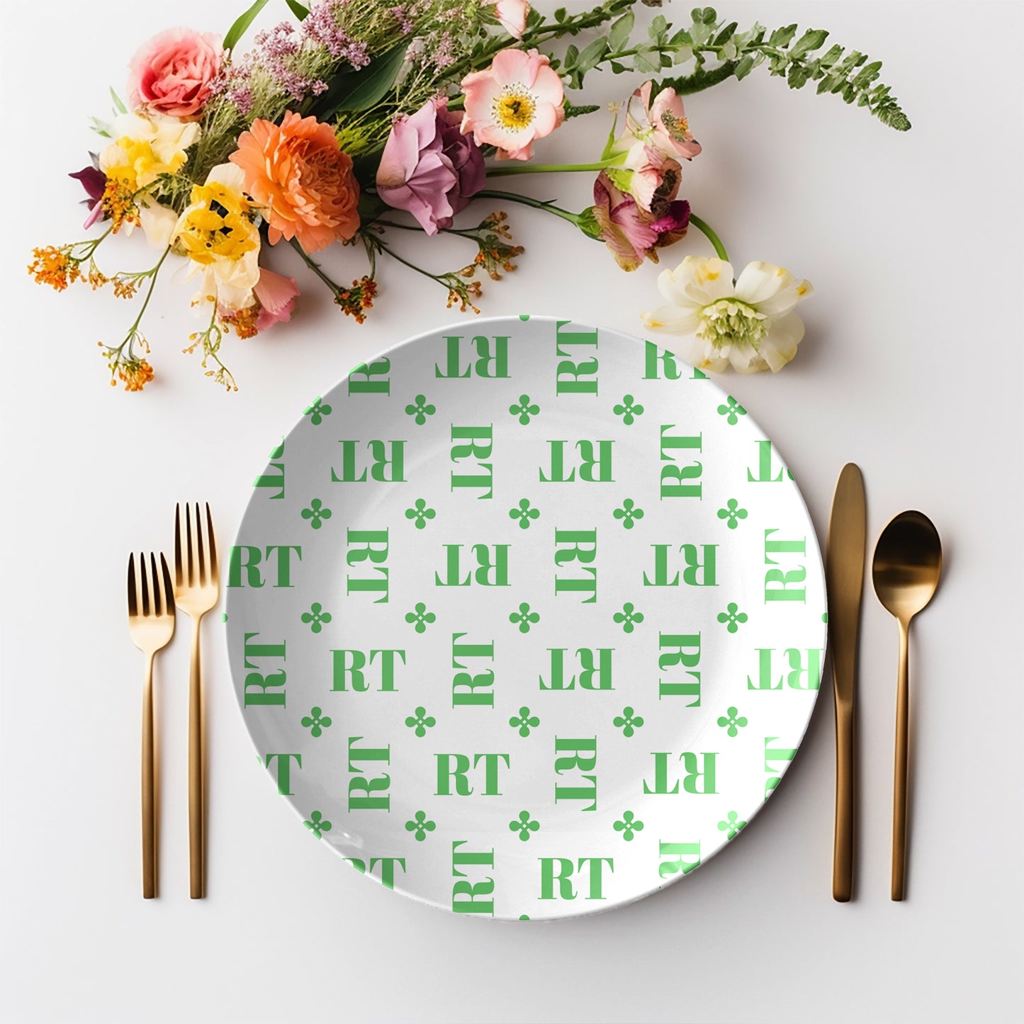 Personalized White and Green Stylized Monogram Plate Set features customized initials set in a repeating pattern accented with a stylish motif for an all-over, unique custom design.