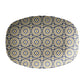 Mosaic bistro tile serving platter has a circular pattern in black, gold and cream.