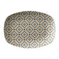 Bistro tile serving platter with a black and gold diamond pattern.