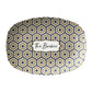 Oval serving platter in a bistro tile print with a hexagon pattern in black, gold and cream. Personalize with any custom text.