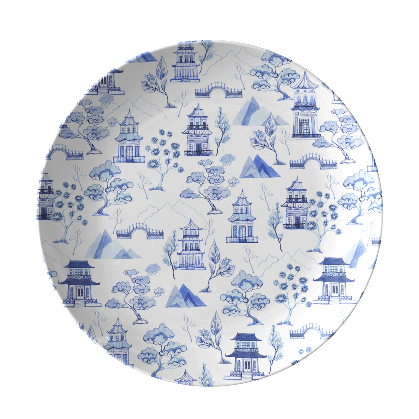 Blue chinoiserie toile pattern of pagodas and trees printed on white plate
