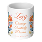 White mug with floral design and text on a white background