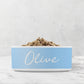 Personalized dog bowl in baby blue and white.