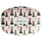 Decorative serving plate with Christmas tree and bow pattern on a white background
