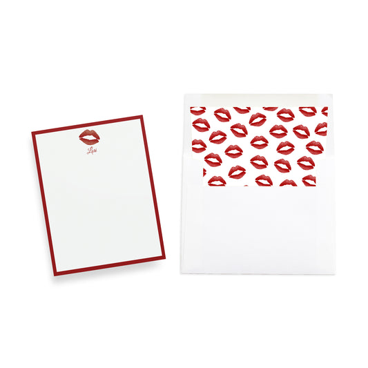 Two stationery items with a red lip prints and custom text or name on a white background