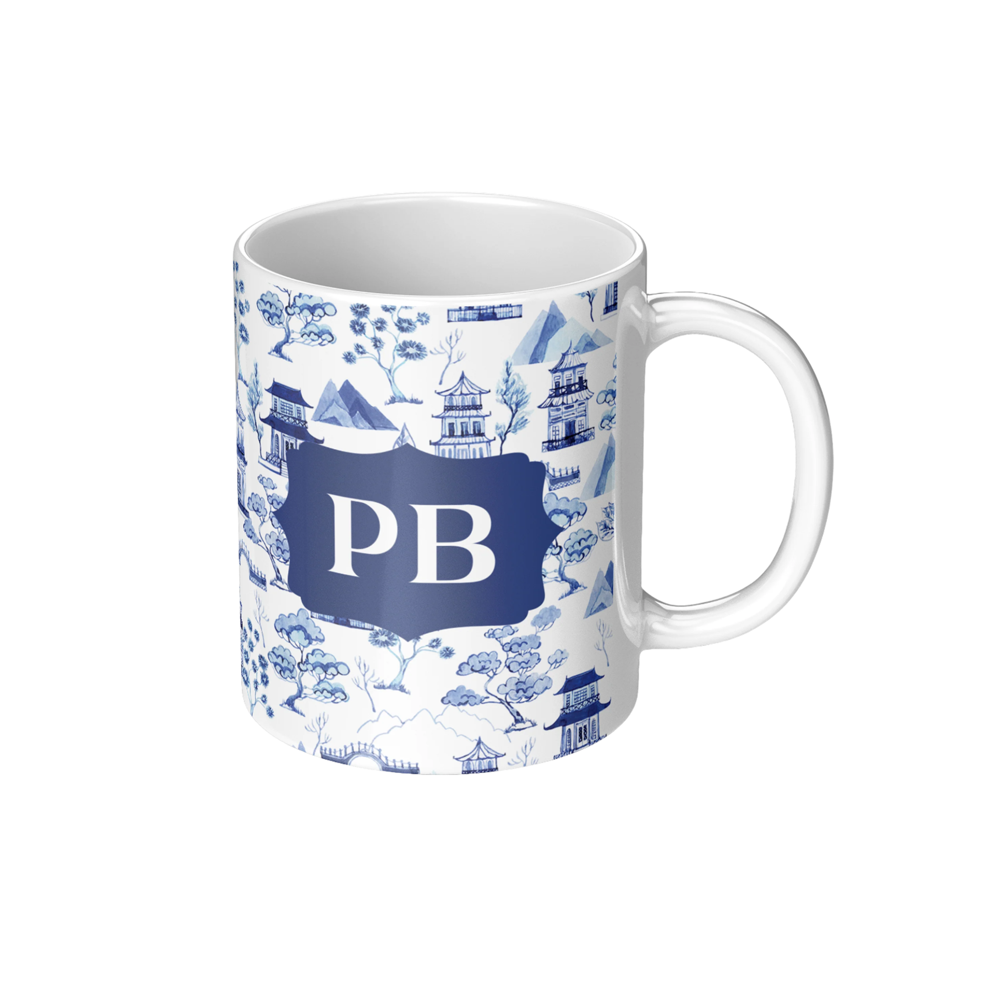 Personalized ceramic coffee mug with chinoiserie toile print in blue and white with custom monogram initials.
