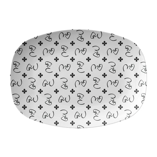 Personalized White and Black Stylized Monogrammed Platter features customized initials set in a repeating pattern accented with a stylish motif for an all-over, unique design.