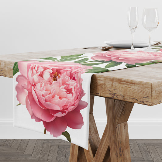 Pink peony floral table runner with pink flowers on a wood table