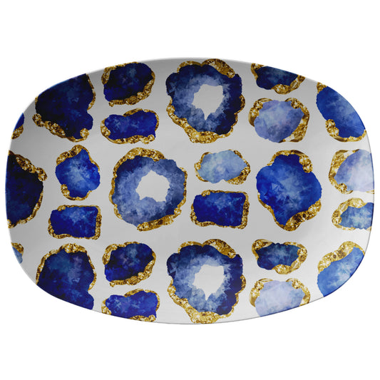 Sapphire blue and gold jewels printed on a white serving platter
