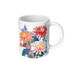 White ceramic mug with aster floral design on a white background