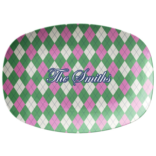 Oval serving platter has an argyle diamond pattern in green and pink and can be personalized with any custom text.