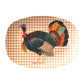 Oval serving platter features a watercolor illustrated turkey against a warm pumpkin-orange gingham background, creating a timeless look for your Thanksgiving table.