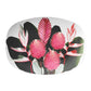 Modern serving platter with lush colorful pink tropical flowers 