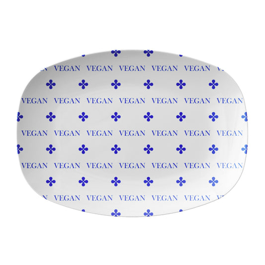 Vegan friendly serving platter features white background and blue text that says VEGAN