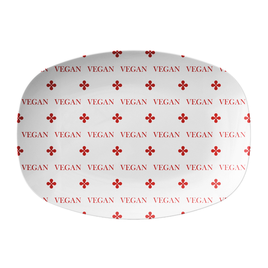 White oval serving platter with VEGAN print in red - labeled to alert plant based foods