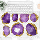Purple and gold large gemstones are printed on a polyester fabric mat that reverses to nonskid rubber back. Lovely for your desk, kitchen counter, bar cart and more.