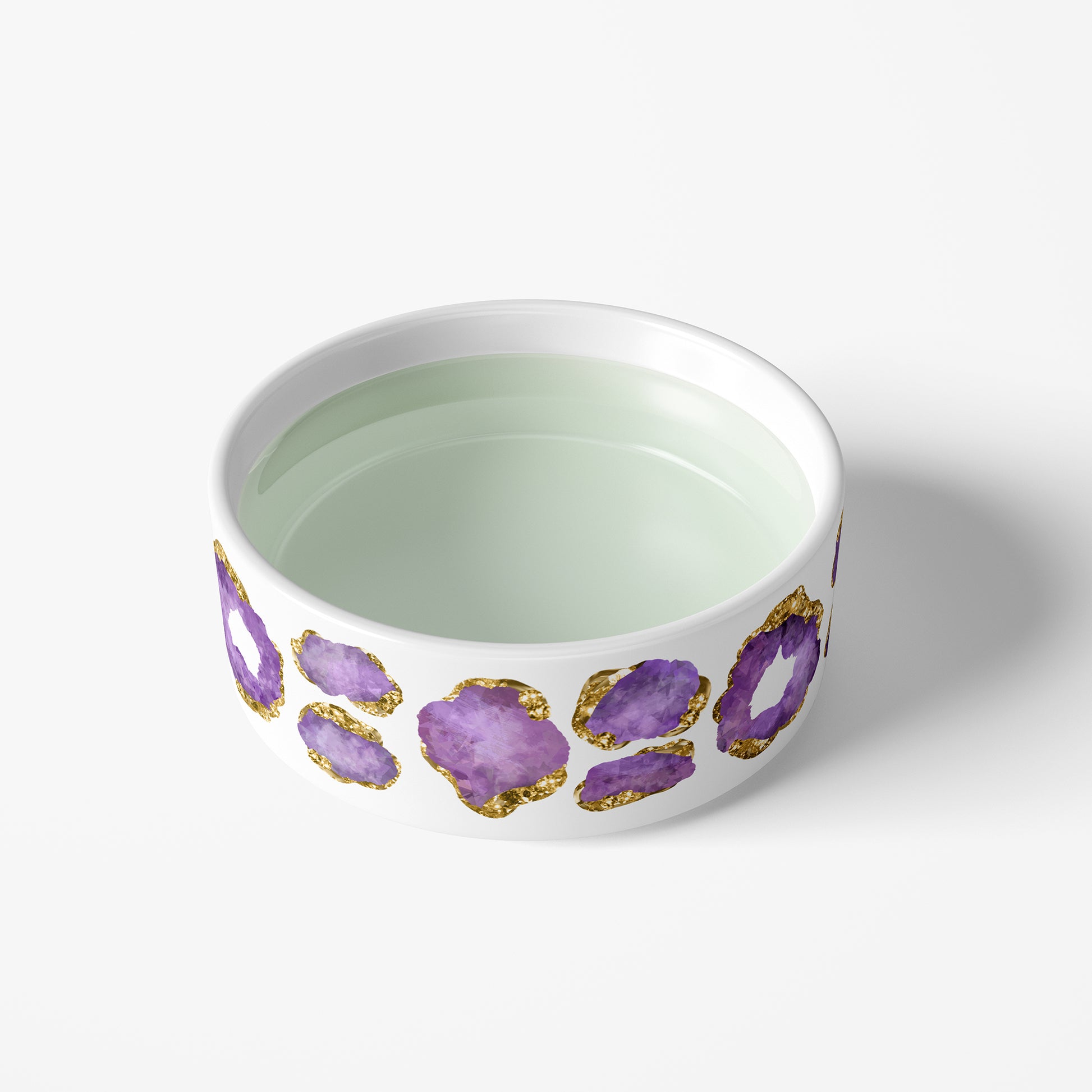 No spill pet water bowl made of heavy white ceramic with purple jewel print