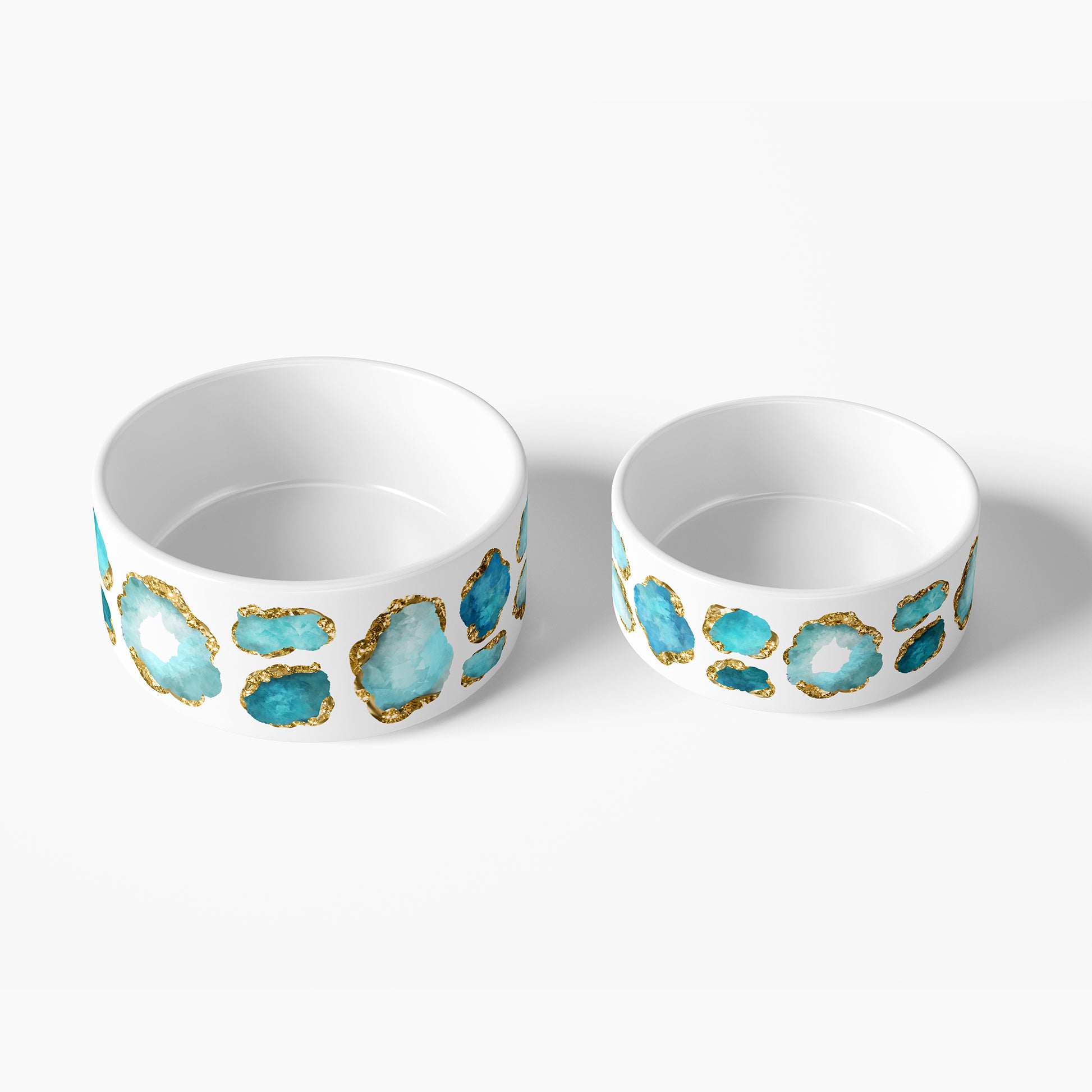 Large and small ceramic pet bowls with aqua blue and gold jewel print