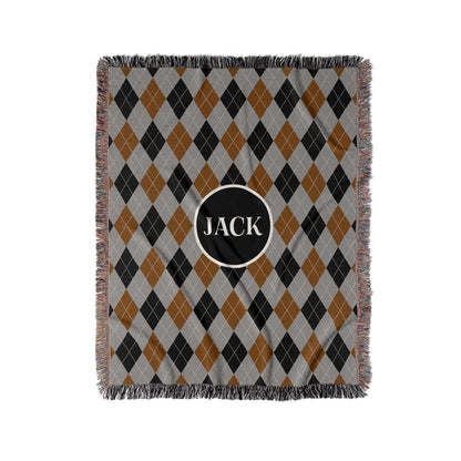 Argyle woven throw blanket in grey, black and rust. Personalized text with any name or word.