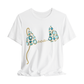 White t-shirt with blue and gold jewel bikini top design and custom name on a white background