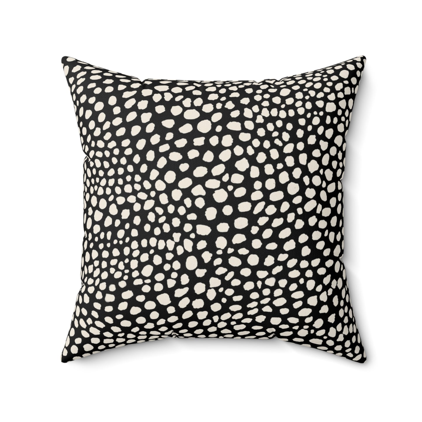 Square black throw pillow with warm white cream cheetah spots