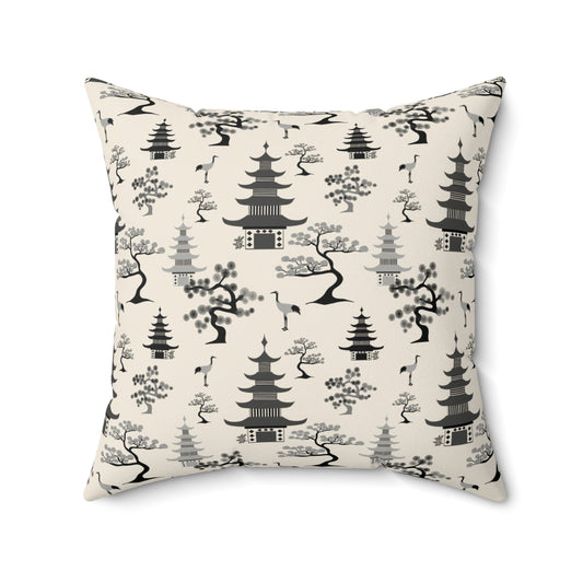 Chinoiserie landscape square throw pillow in black and cream features pagodas, bonsai trees and crane birds on white background.