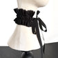 Black ruffled collar choker with ribbons tied in bow on a mannequin neck