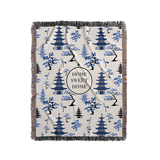 Personalized throw blanket in blue and off white chinoiserie pattern.