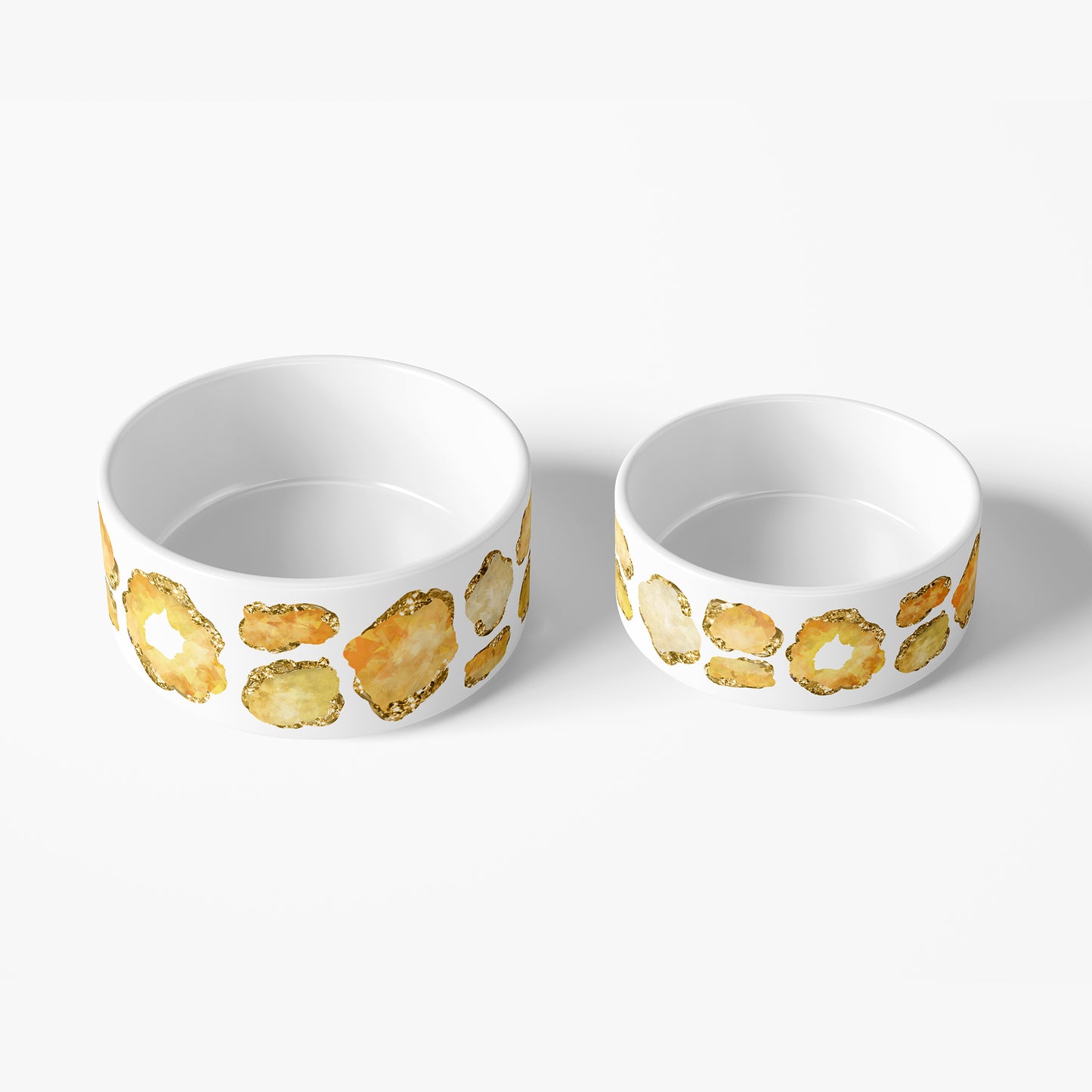 Large and small ceramic pet food bowls with yellow and gold citrine jewel print