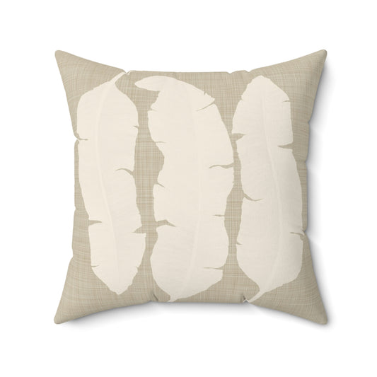 Banana leaves in off white on beige textured pillow.