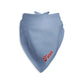 Personalized blue chambray-like dog bandana with custom name in red on a white background