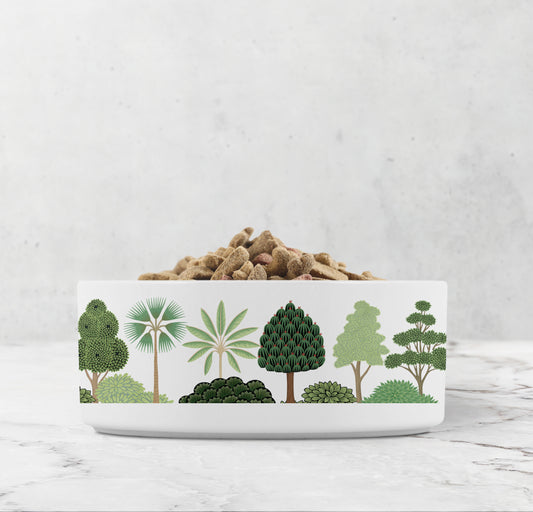 Heavy high gloss white ceramic dog bowl with tropical palm tree print in green