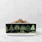 Large ceramic dog bowl with sophisticated chic black and green palm tree print.