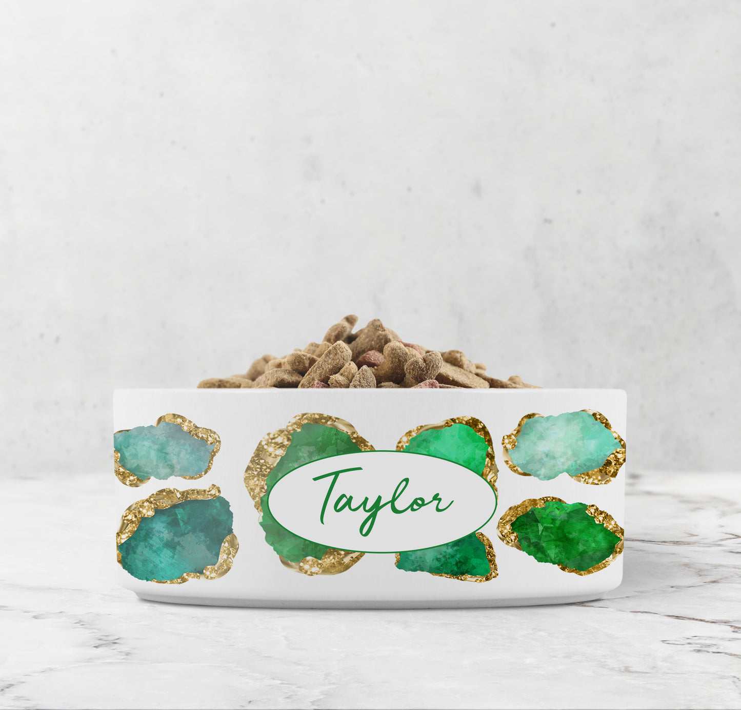 Beautiful emerald green and gold jewels are printed on a white ceramic bowl. Personalize with any name or word for your dog or cat.