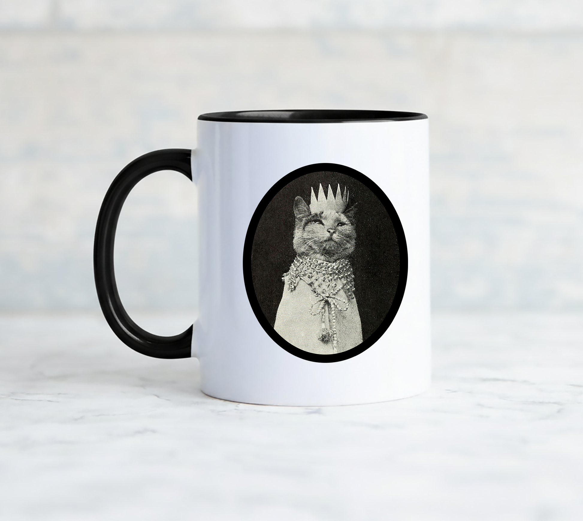 White mug with black handle has a grainy vintage cat portrait printed on one side while the funny phrase You may exist but I notice nothing is printed on the other side.
