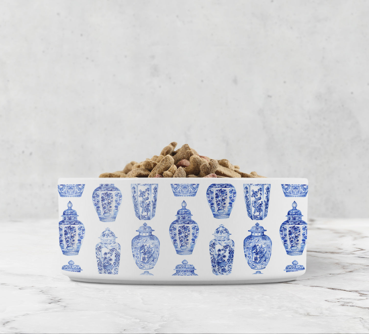 White ceramic dog bowl has a pattern of chinoiserie ginger jars in blue and white printed all around the perimeter.