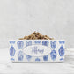 White dog bowl with a chinoiserie ginger jar pattern in blue and white. Add any custom name or word to personalize.