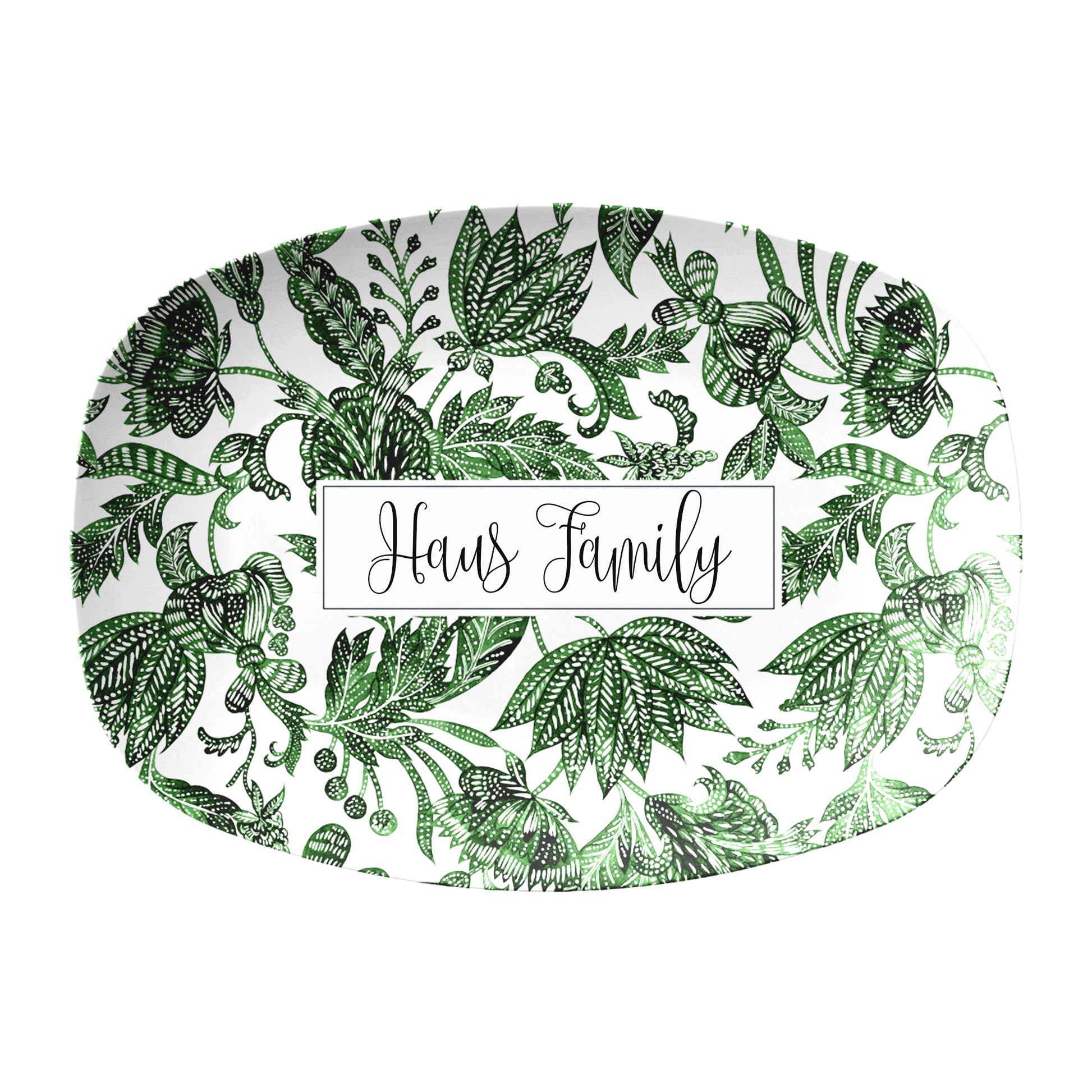 Green floral batik pattern is printed on a white oval serving platter personalized with any name or text.