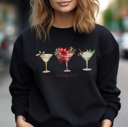 Three gorgeous Christmas cocktails and the words Holiday Cheer are printed on this cozy shirt. Long sleeve, crewneck sweatshirt. 