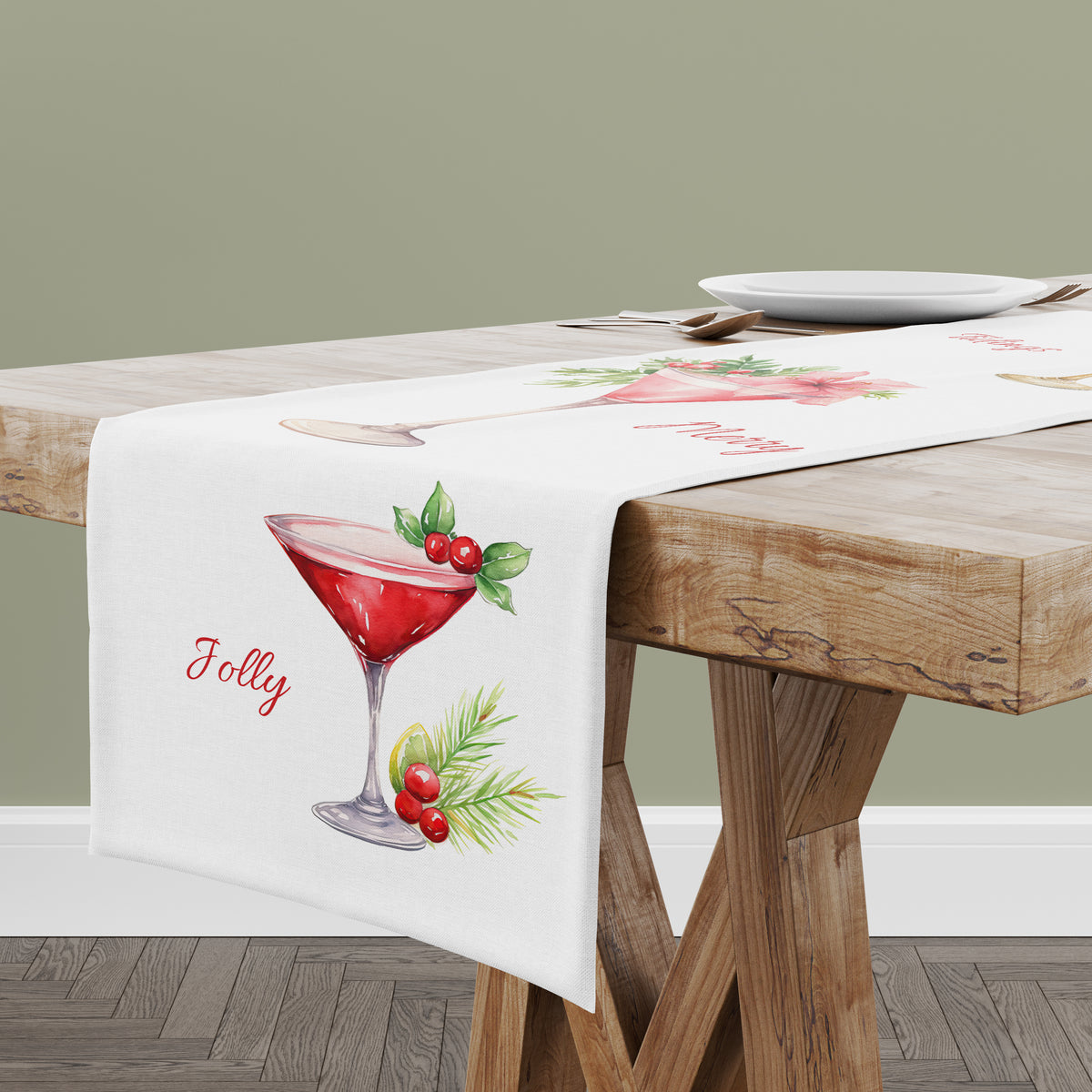 Glamorous holiday Christmas cocktails with garnishes are printed onto a white table runner