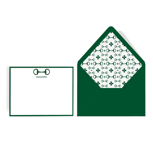 Equestrian preppy horsebit stationery set includes  a white notecard with border and custom name and matching green envelope lined with baffle bit patterned paper.