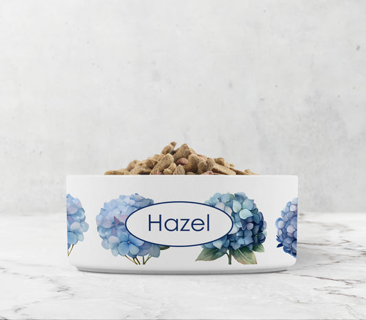 Blue and purple hydrangea flowers printed on white dog bowl personalized with any text.
