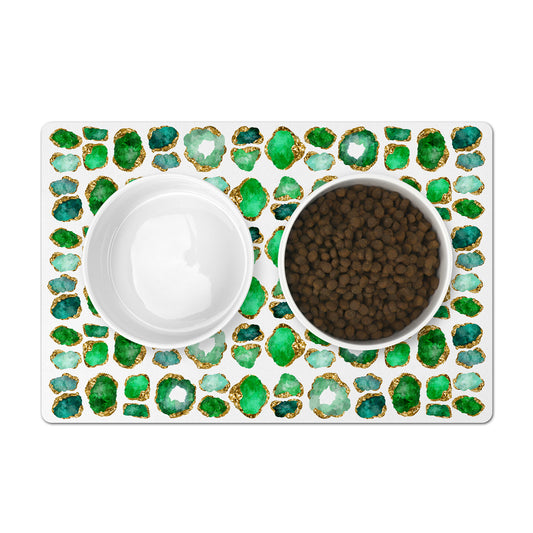 Pet feeding mat is printed with beautiful emerald green and gold gemstones, machine washable, nonskid rubber back.