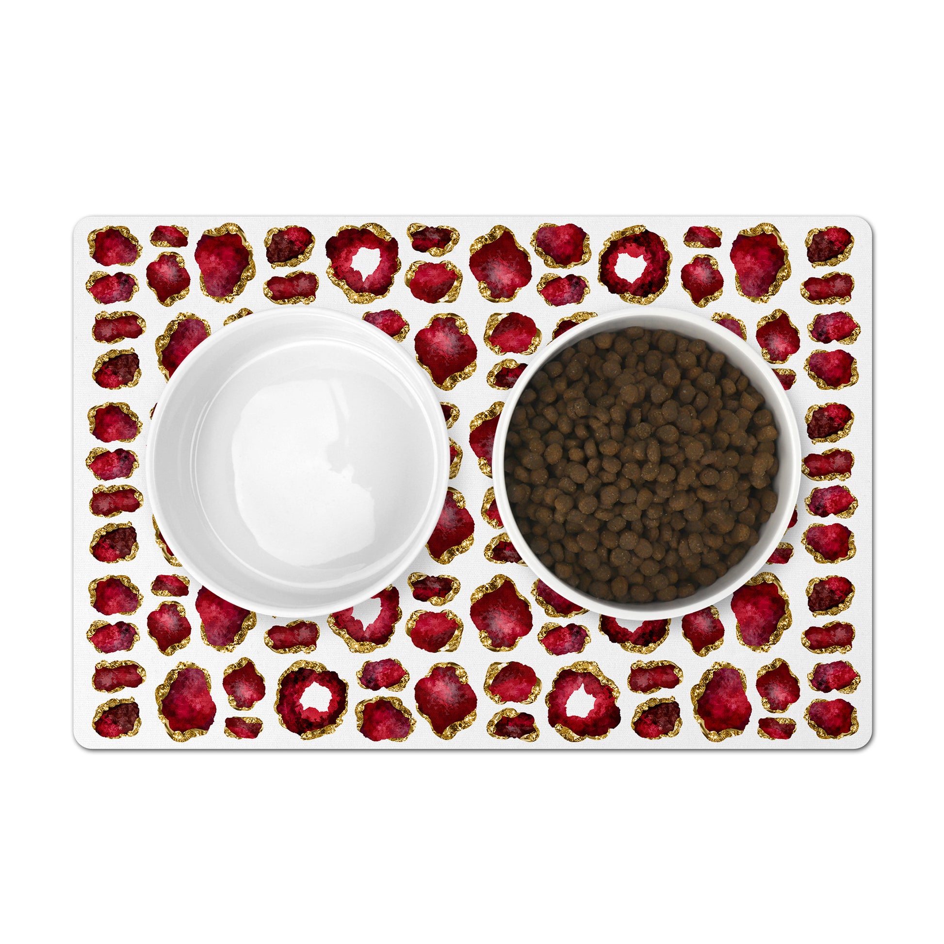 Jewel print pet food mat for your dog or cat bowls. Gorgeous ruby red and gold placemat is machine washable and has a nonskid rubber back.