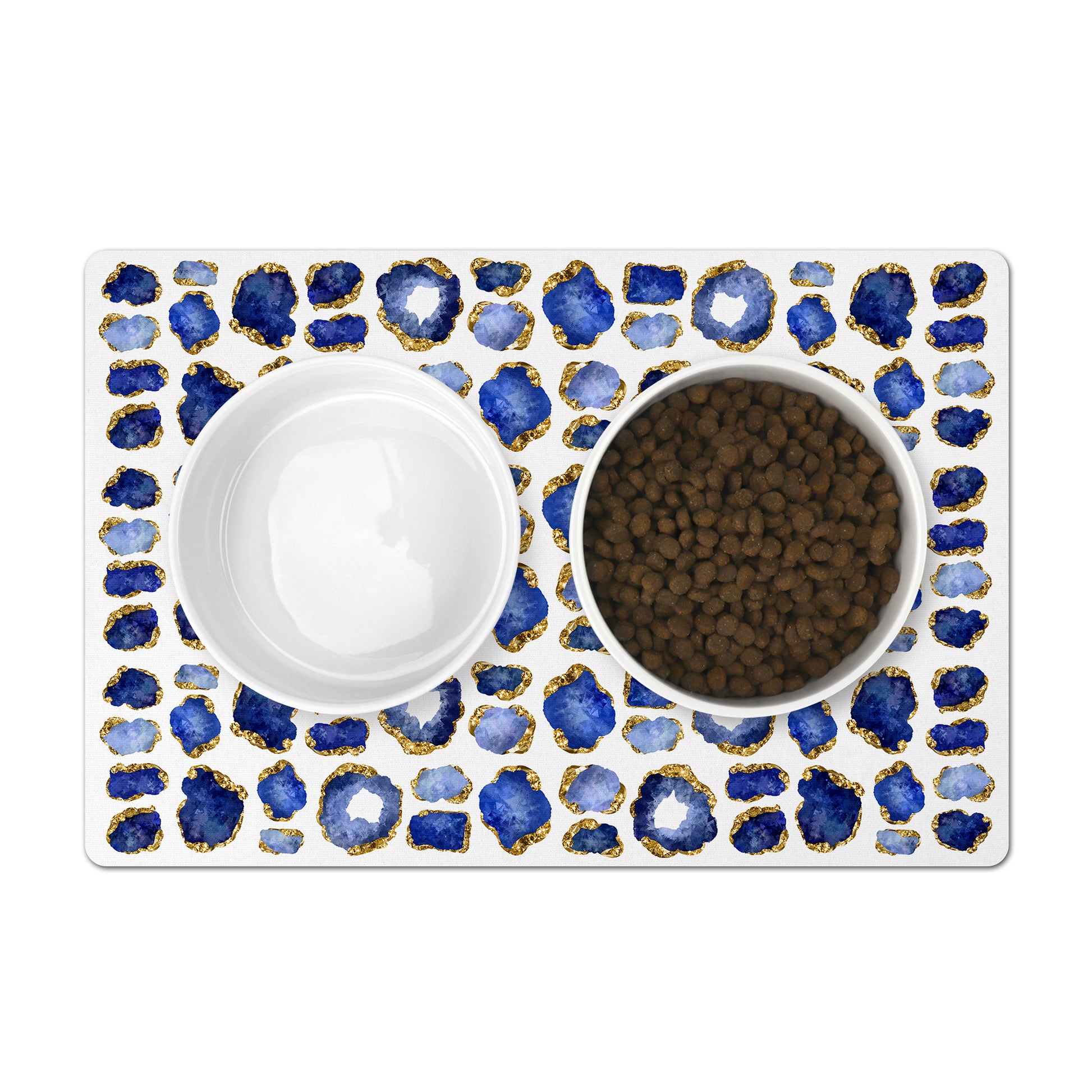 Jewel art print pet placemat has gorgeous blue sapphire and gold. Pet feeding mat is machine washable and has a nonskid rubber back.