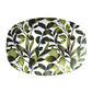 oval serving platter with green leaf pattern on a white background