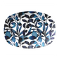 Oval serving platter with modern leaf print in navy blue and white